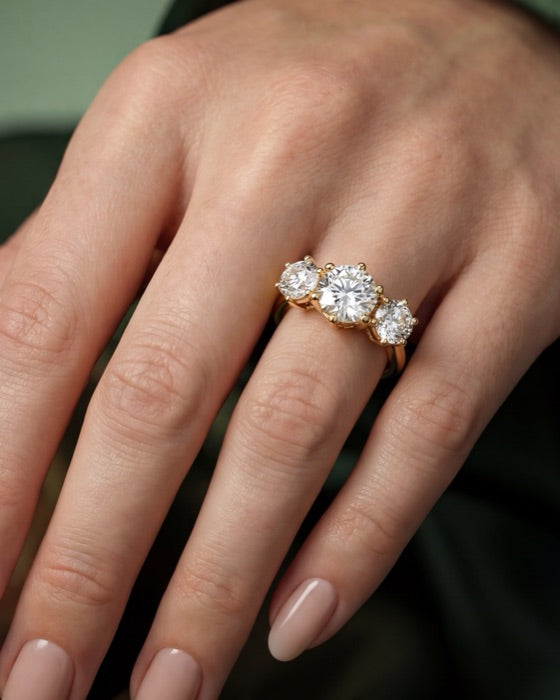 Isolde round engagement ring on the hand