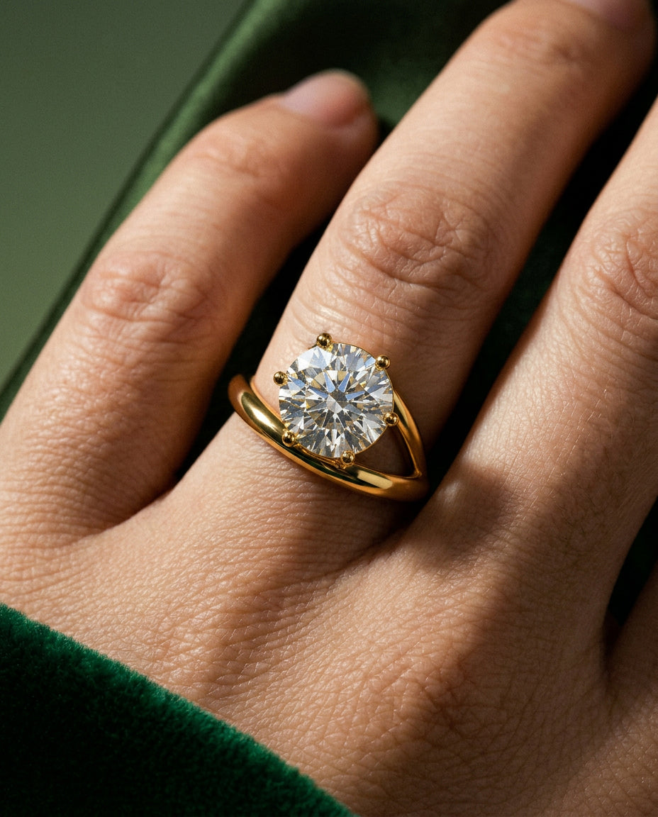 Eclipse round engagement ring worn on the hand