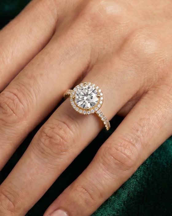 Elysian round engagement ring on the hand
