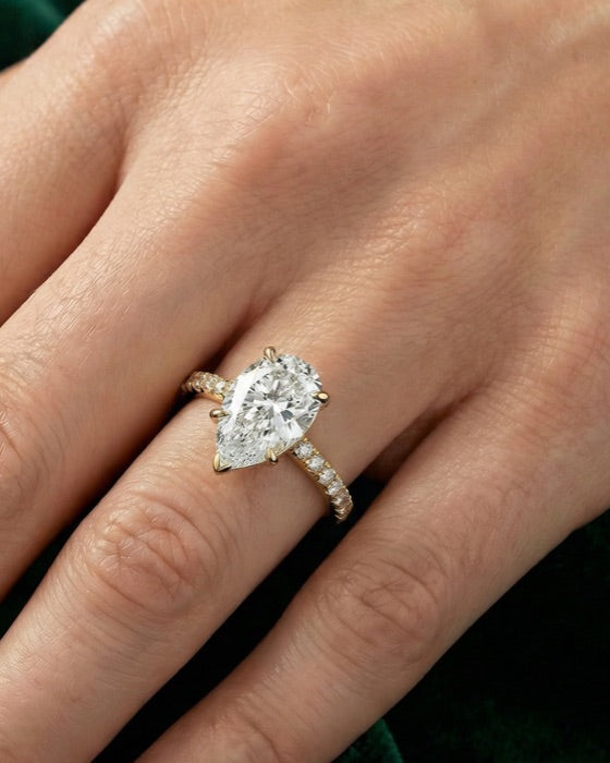 Juliette pear engagement ring on the hand